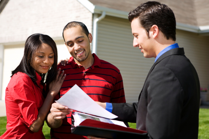 Home Buyer With Real Estate Agent